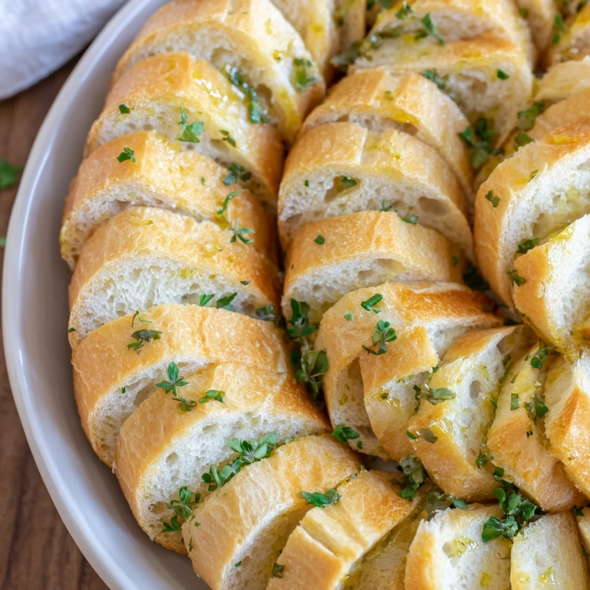 Crispy, toasted baguette slices circle beautifully on the baking sheet for this simple appetizer.