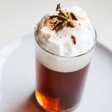 Creamy cold foam cascades over a refreshing glass of Homemade Iced Chai, a flavorful, homemade delight.