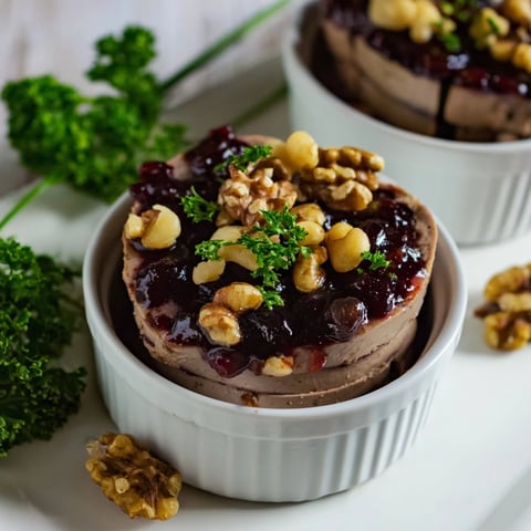 Creamy layers of The Velvet Underground appetizer with mixed nuts and fig jam, perfect for sharing.