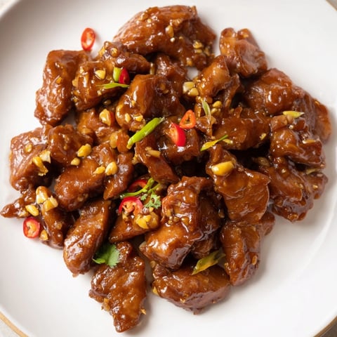 Golden brown Vietnamese Caramel Chicken with a glistening glaze, ready to serve over rice.