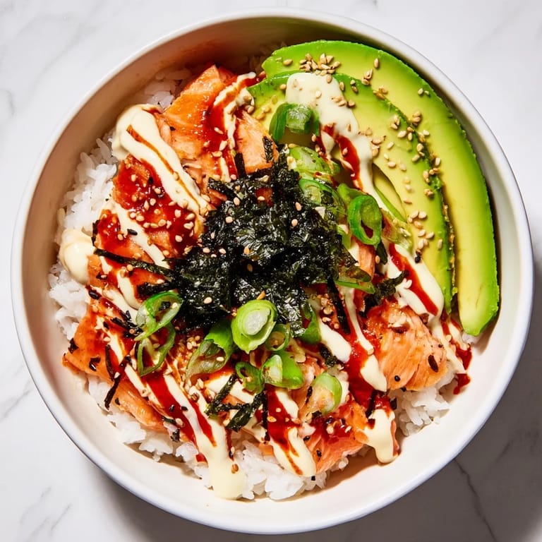 Imagine the textures: creamy avocado paired with tender, flaked salmon in this easy Classic Salmon Rice recipe.