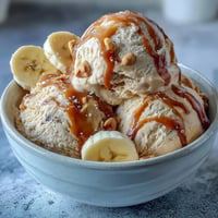Creamy 4-ingredient peanut butter banana ice cream with ripe bananas and rich peanut butter blended until smooth and dreamy.